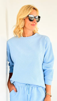 French Terry Wide Long Sleeve Top- Light Blue-170 Bottoms-Veveret-Coastal Bloom Boutique, find the trendiest versions of the popular styles and looks Located in Indialantic, FL