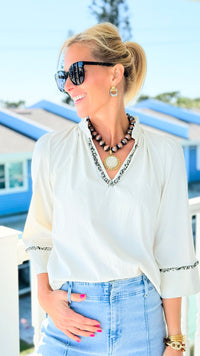 Fringe Statement Blouse