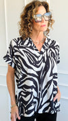 Jungle Rhythm V-Neck Top-110 Short Sleeve Tops-JODIFL-Coastal Bloom Boutique, find the trendiest versions of the popular styles and looks Located in Indialantic, FL