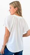 Flutter Away Pleated Top - Ivory-110 Short Sleeve Tops-Ariella-Coastal Bloom Boutique, find the trendiest versions of the popular styles and looks Located in Indialantic, FL
