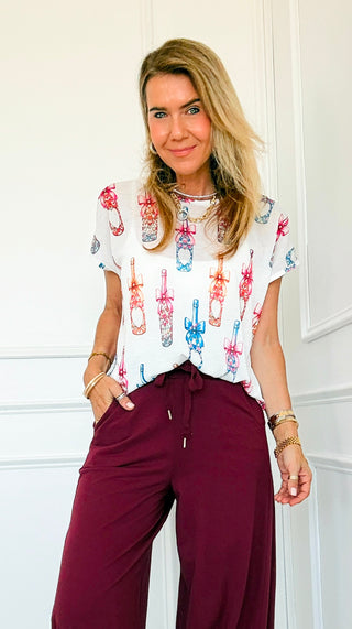 Champagne Wishes Italian Graphic Aria Top