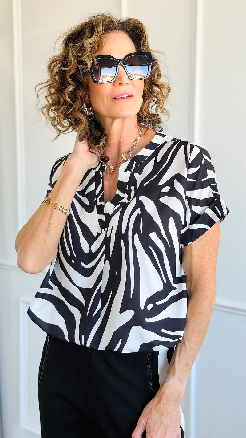 Jungle Rhythm V-Neck Top-110 Short Sleeve Tops-JODIFL-Coastal Bloom Boutique, find the trendiest versions of the popular styles and looks Located in Indialantic, FL