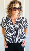 Jungle Rhythm V-Neck Top-110 Short Sleeve Tops-JODIFL-Coastal Bloom Boutique, find the trendiest versions of the popular styles and looks Located in Indialantic, FL