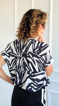 Jungle Rhythm V-Neck Top-110 Short Sleeve Tops-JODIFL-Coastal Bloom Boutique, find the trendiest versions of the popular styles and looks Located in Indialantic, FL