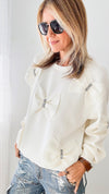 Fiora French Scuba Ribbon-Bow Sweatshirt - White-130 Long Sleeve Tops-Joh Apparel-Coastal Bloom Boutique, find the trendiest versions of the popular styles and looks Located in Indialantic, FL