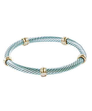 Bracelet with gold accents on a white background