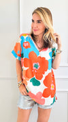 Colorful Daisy Floral Top-110 Short Sleeve Tops-Lovely Melody-Coastal Bloom Boutique, find the trendiest versions of the popular styles and looks Located in Indialantic, FL