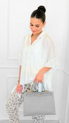 Relaxed Charm Hi-Lo Top-100 Sleeveless Tops-mystree-Coastal Bloom Boutique, find the trendiest versions of the popular styles and looks Located in Indialantic, FL