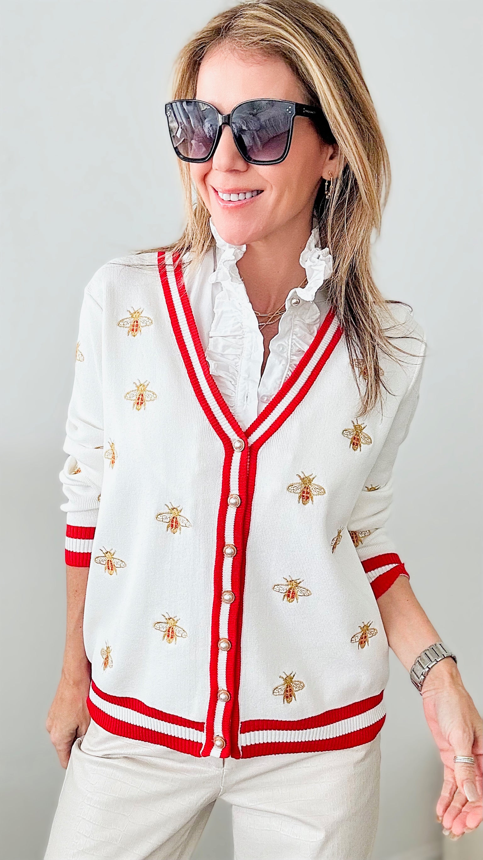 Here’s the Buzz Pearl Button Cardigan - White-150 Cardigan Layers-CBALY-Coastal Bloom Boutique, find the trendiest versions of the popular styles and looks Located in Indialantic, FL