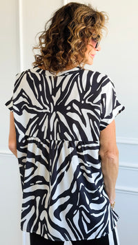 Jungle Rhythm V-Neck Top-110 Short Sleeve Tops-JODIFL-Coastal Bloom Boutique, find the trendiest versions of the popular styles and looks Located in Indialantic, FL