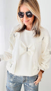 Fiora French Scuba Ribbon-Bow Sweatshirt - White-130 Long Sleeve Tops-Joh Apparel-Coastal Bloom Boutique, find the trendiest versions of the popular styles and looks Located in Indialantic, FL
