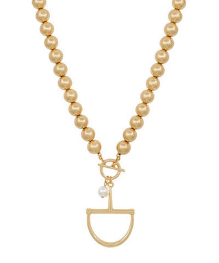 Pearl necklace with a gold pendant on a white background