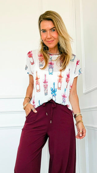 Champagne Wishes Italian Graphic Aria Top