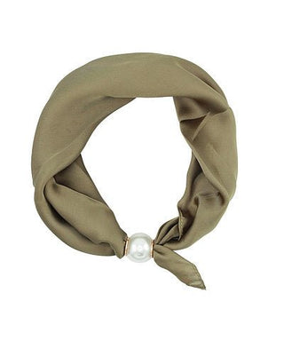 Khaki headband with a pearl knot on a white background