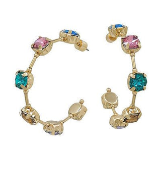 Gold hoop earrings with multicolored gemstones on a white background