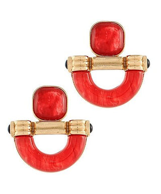 Pair of red earrings with gold accents on a white background
