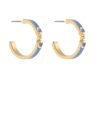 Gold hoop earrings with blue accents on a white background