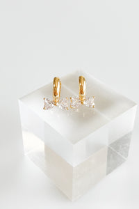 Mini CZ Ribbon Huggie Earrings-230 Jewelry-FAME ACCESSORIES-Coastal Bloom Boutique, find the trendiest versions of the popular styles and looks Located in Indialantic, FL