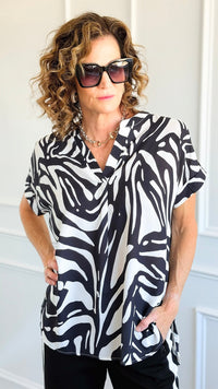 Jungle Rhythm V-Neck Top-110 Short Sleeve Tops-JODIFL-Coastal Bloom Boutique, find the trendiest versions of the popular styles and looks Located in Indialantic, FL