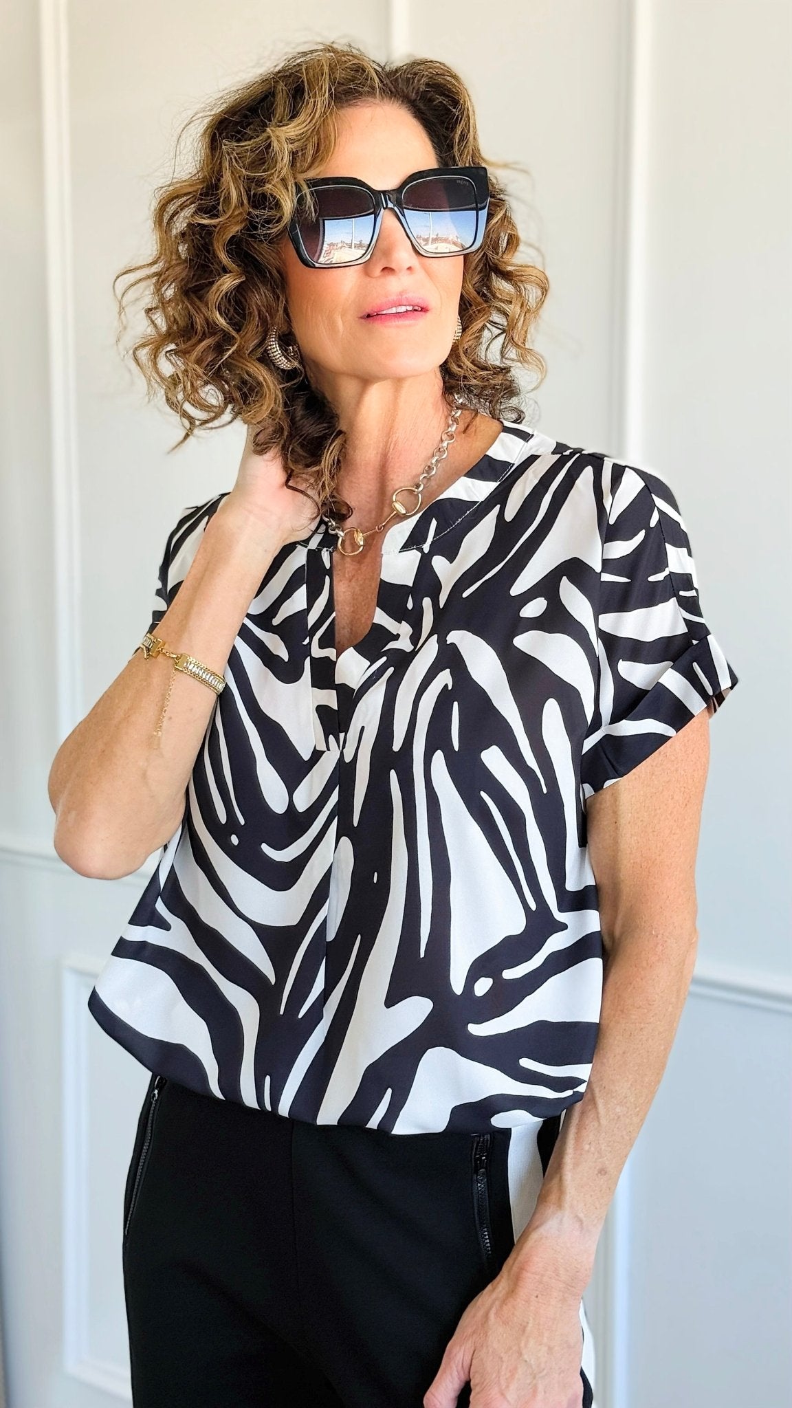 Jungle Rhythm V-Neck Top-110 Short Sleeve Tops-JODIFL-Coastal Bloom Boutique, find the trendiest versions of the popular styles and looks Located in Indialantic, FL