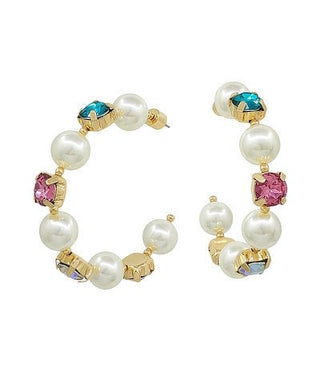 Pair of earrings with pearls and colorful gemstones on a white background