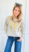 Regal Golden Nutcracker Sweatshirt-Sandstone-110 Long Sleeve Tops-SUGAR STITCH-Coastal Bloom Boutique, find the trendiest versions of the popular styles and looks Located in Indialantic, FL