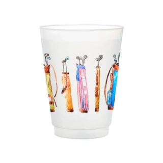 White cup with colorful golf club design on a white background