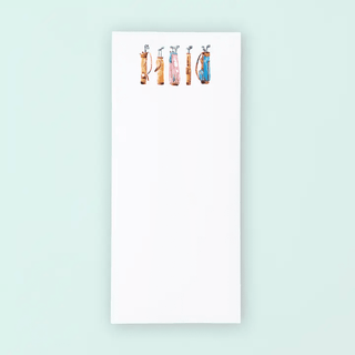 Notepad with colorful illustrations of bottles on a light blue background
