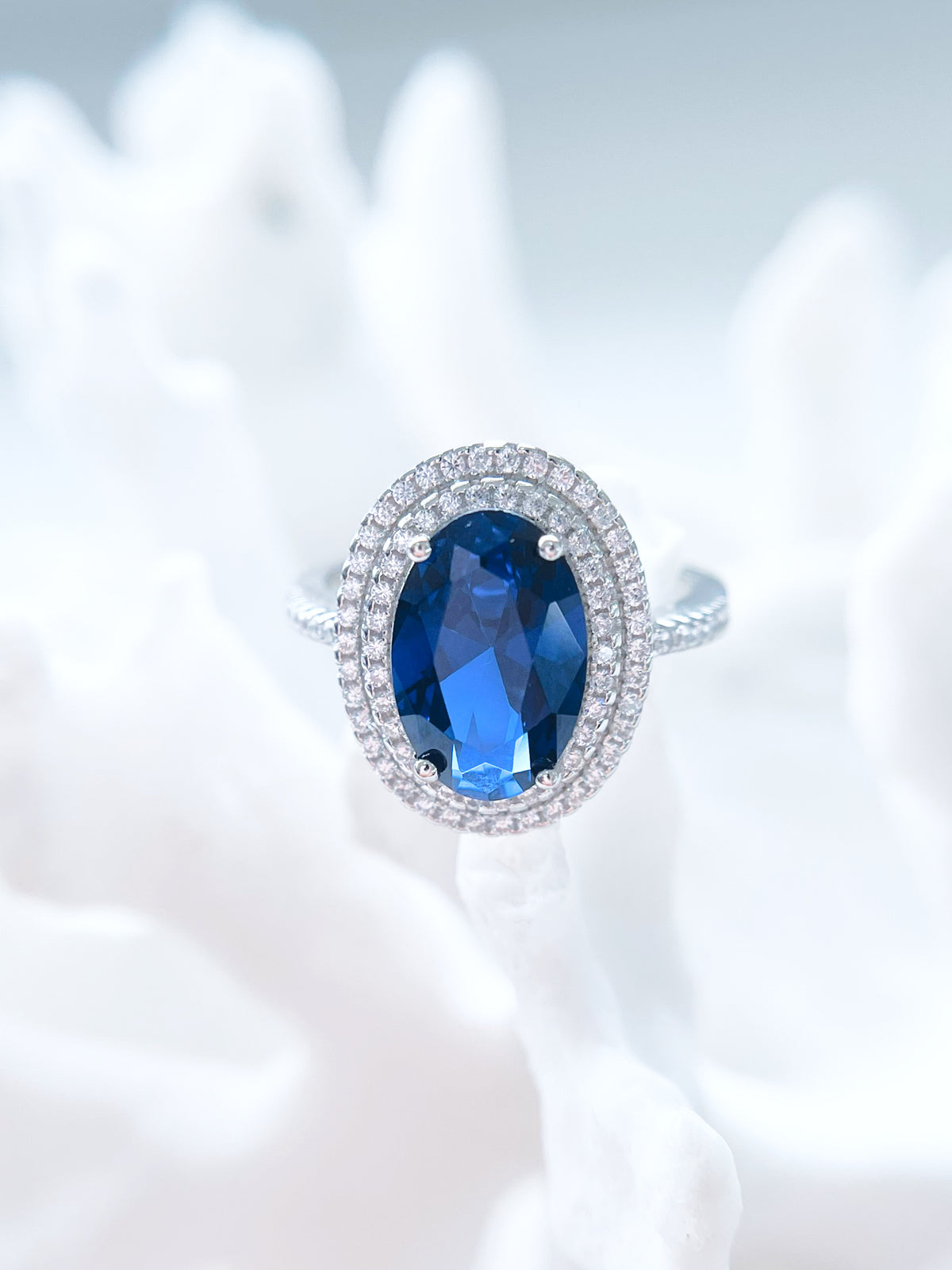 Sapphire Oval CZ Halo Ring-230 Jewelry-NYC-Coastal Bloom Boutique, find the trendiest versions of the popular styles and looks Located in Indialantic, FL